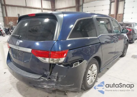 2014 Honda Odyssey Lx z USA, uszkodzony, nr VIN 5FNRL5H2XEB067764